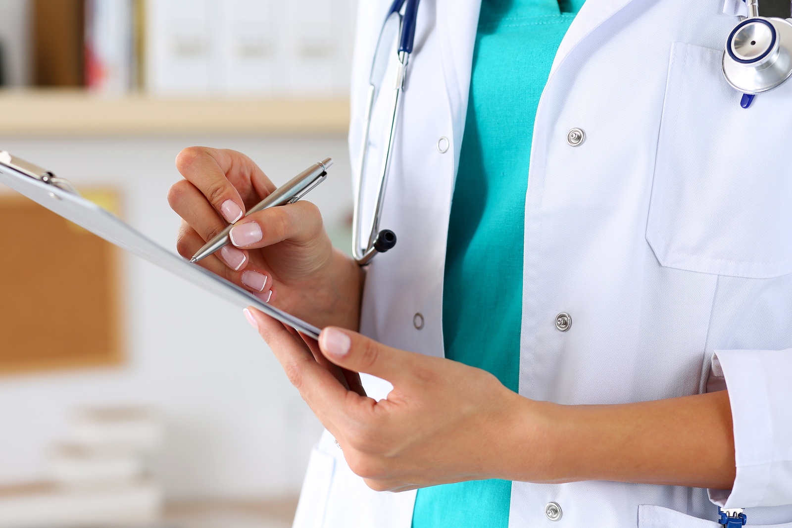 woman doctor with clipboard