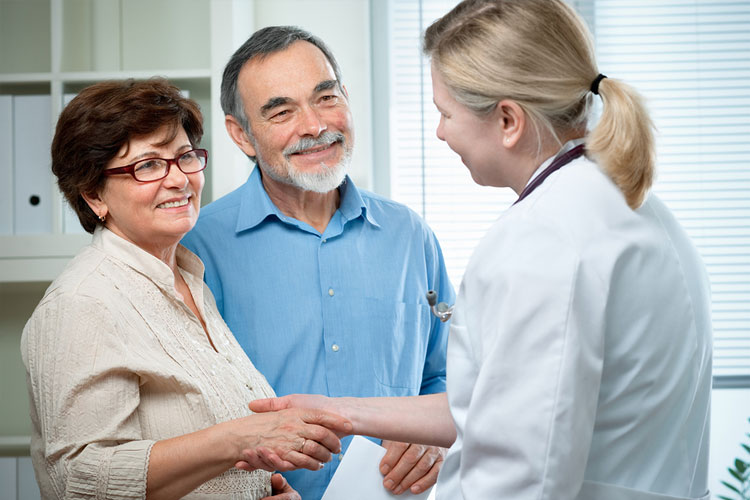 Senior couple visiting doctor