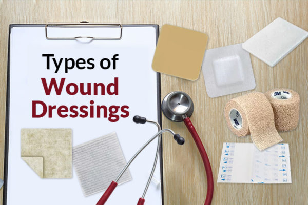 Clipboard on table with different types of wound dressings