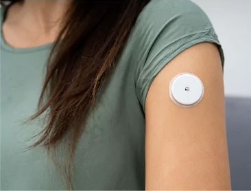 A Dexcom G6 sensor and receiver