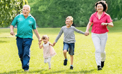grandparents playing with grand children