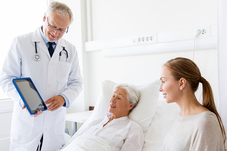 Patient and daughter talking to a doctor