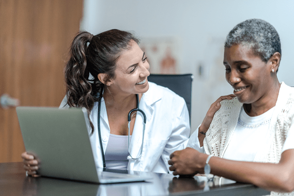 With every new prescription, ask the prescriber these questions: woman talking to her doctor