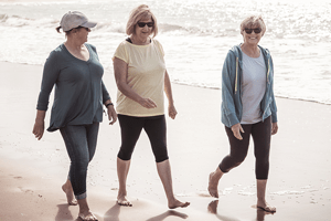 Take a lunchtime walk. 3 women going for a walk