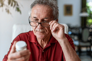 man taking medicine